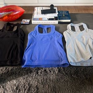 3 size 10 Lululemon tank tops